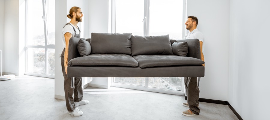 professional movers lift sofa